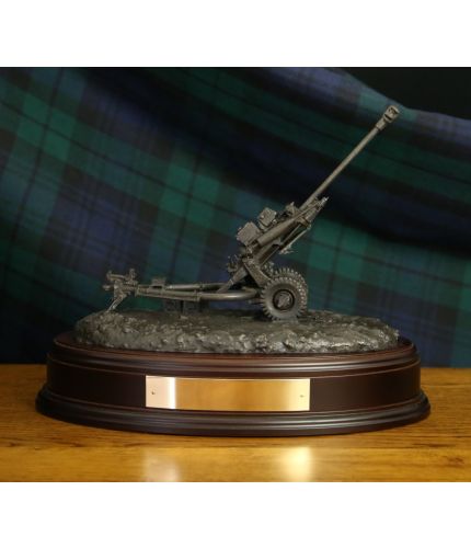 Modern British Army Royal Artillery 105mm Light Gun. Silver, Bronze or Painted. The sculpture is mounted on a wooden base which is designed to take a cap badge and engraved plate. We offer a fully engraved brass plate.