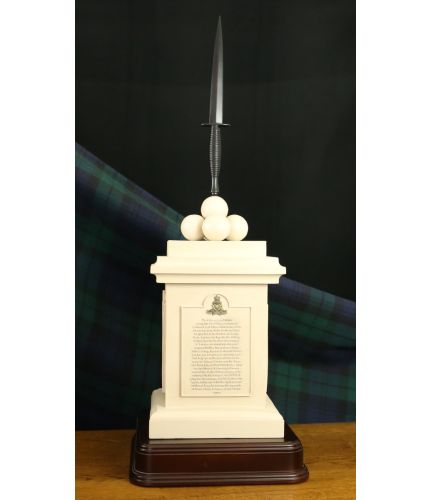 This is a scale replica of the 29 Commando R A Memorial which is outside the Citadel in Plymouth. The base is cast in a china white mix and the Black Skyes Dagger is a separate piece. We offer free engraving of a brass plate on the wooden base