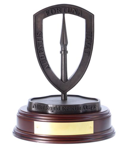 Double sided 3d Allied Rapid Reaction Corps (ARRC) Crest.It stands 13" tall on this standard wooden base and is the perfect presentation gift for anyone serving in the ARRC HQ.  We Include an engraved brass plate if required 