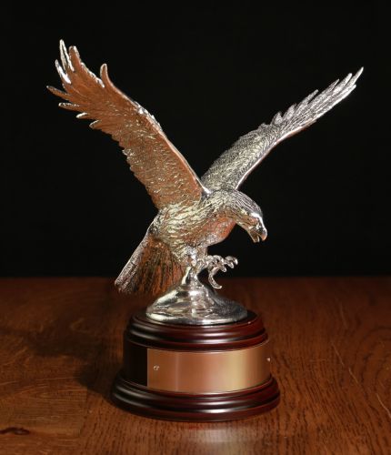 Polished pewter eagle used by the Army Air Corps and the Old design for 16 Air Assault Brigade. The statue is of an eagle with claws outstretched. We offer a choice of wooden bases and include an engraved nickel silver plate.