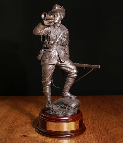 This is a 12" scale sculpture of an Australian Army Soldier during World War One. We include this wooden base as standard and offer an engraving plate free of charge.