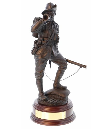 This is a 12" scale sculpture of an Australian Army Soldier during World War One. We include this wooden base as standard and offer an engraving plate free of charge.