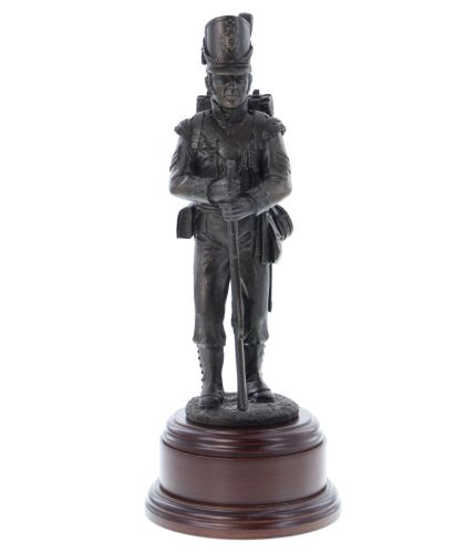Bronze resin statue of a guardsman of the Grenadier Guards dressed in parade dress with bearskin and SA80