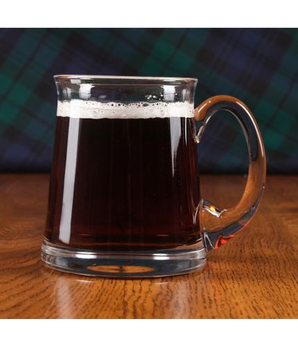 A traditional curved Ale tankard. Perfect to engrave and keep for special occasions.