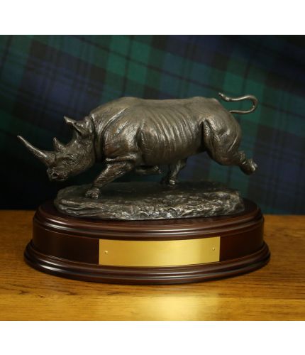 This is our sculpture of a male African Black Rhinoceros, charging. It's made for 1 Armd Division as well. We offer a choice of bases and free engraving