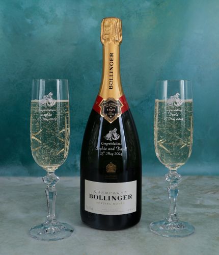 An ENGRAVED 75cl Bottle of Bollinger Champagne and 2 Engraved Champagne Flutes in a Gift Box. The finished set is packed into a deep foam cutout presentation box. We agree the final engraving after you order. 
