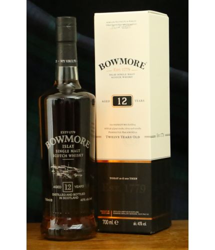 A bottle of 12 Year Old Bowmore Single Malt Scotch Whisky. We engrave to your exact specifications and will sort this out after you order. We will provide you with a pre-engraving draft before we commence work.