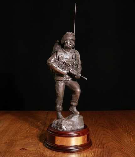 This is a sculpture of a Bowman Signaller of the British Army in full operational combat dress. We offer a choice of regimental badges, wooden bases and a free engraved plate on the front. 