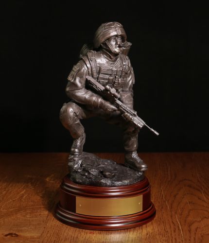 British Army Frontline Medic. This Regimental Statuette of a British Army Medic makes an Ideal mess presentation retirement gift. A choice of wooden base, badge and brass engraved plate included