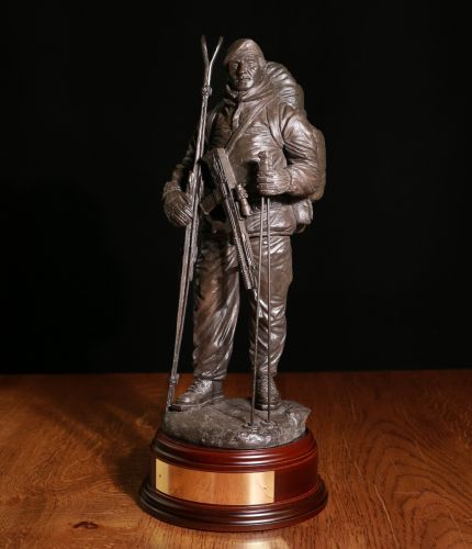 12" scale cold cast bronze resin sculpture of an Arctic Warfare British Army Soldier, SA80 and wearing a Beret. We include a choice of bases with engraved brass plates