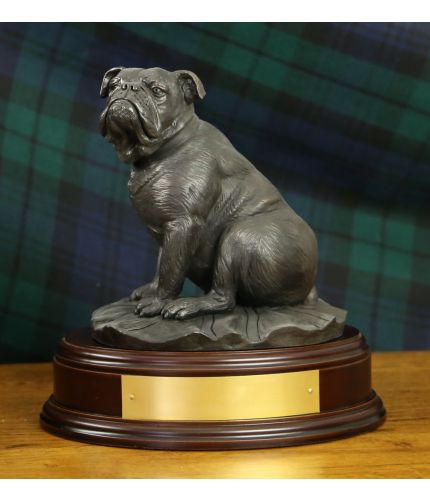 A Cold Cast Bronze Britsh Bulldog sculpted in a 10" tall scale (on this wooden base) and sitting on a British Union Flag. We can make it in Bronze, Painted and Silver, the wooden base and a brass engraved palte are included.
