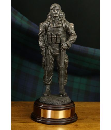 12" scale cold cast bronze resin sculpture of a British Army Mortarman with 81mm Tube. He is wearing webbing and a bergan with his SA80 in his right hand and holding the mortar tube with the left. Included is a personalised engraved brass plate.