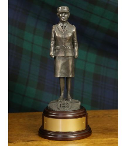 A Statuette of a modern female officer of the British Prison Service in parade dress. This one of our 8 inch scale statuettes and we include the wooden base and brass plate as standard.