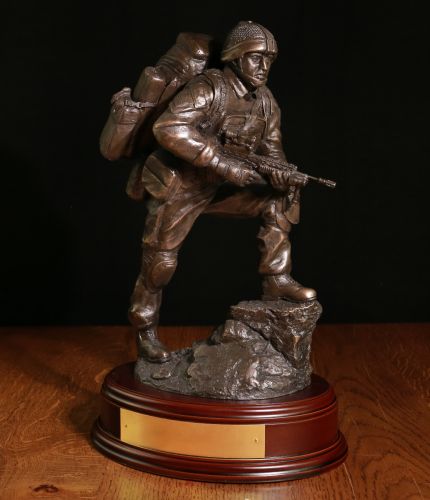 British Soldier acting as a Point Man in a 'fire team'. He's the eyes and ears of the patrol. This piece was sculpted in 2014 during the Op Herrick (Afghanistan) Era. The Wooden base and an engraved brass plate are included.
