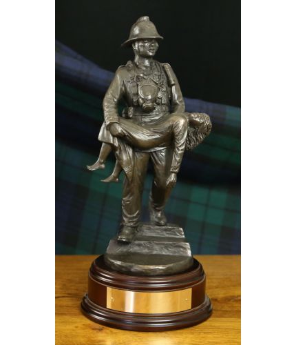One of our early sculptures. A British Fireman Saved with Girl from the 1980's era, Bronze. We offer a choice of wooden base and free engraved plate with this if required