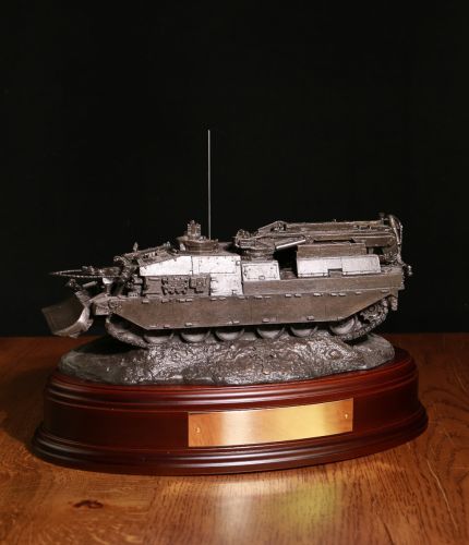 A military presentation piece of a REME CRAARV Armoured Recovery Vehicle. We offer this piece mounted onto a choice of wooden bases. We provide the brass engraved brass plate free of charge as part of the service.