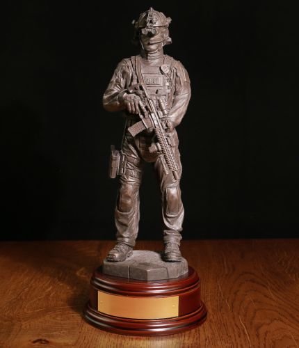 A hand made bronze cold cast statue of a British Counter Terrorist Specialist Firearms Officer. The sculpture is 12 Inches tall, we offer a choice of wooden bases and free engraving service