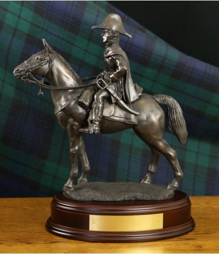 This is our Duke of Wellington statuette. He's mounted on Copenhagen during the Battle of Waterloo and it is made in the 8 inch scale, (overall height 14 inches). We include the standard wooden base and an engraved brass plate.