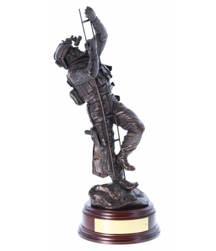 This is a sculpture of a Dutch NL MARSOF Frogman Climbing a scaling ladder at sea. It is sculpted in a 12" scale. We offer a choice of finish and wooden base. An engraved brass plate can be provided free of charge