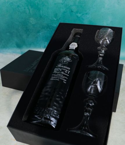 An engraved 75cl Bottle of Fonseca Bin 27 Port and two plain style crystal port glasses in a black foam cut out gift box. The Bottle and glasses can be engraved, and we sort this out with you after order