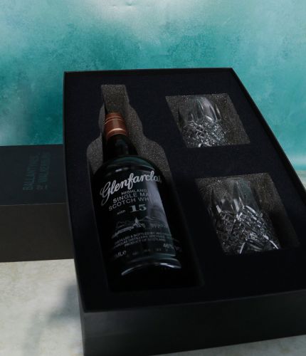 An engraved bottle of 15 Year old Glenfarclas Single Malt Scotch Whisky and two fully cut 10oz crystal whisky tumblers. We will provide you with full engraving artwork for approval before we commence work.