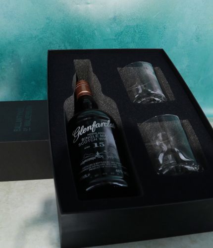 This is a whisky presentation set consisting of an engraved bottle of 15 Year Old Glenfarclas Single Malt Scotch Whisky and two plain style 10oz crystal whisky tumblers. We work with you on what you'd like us to engrave.