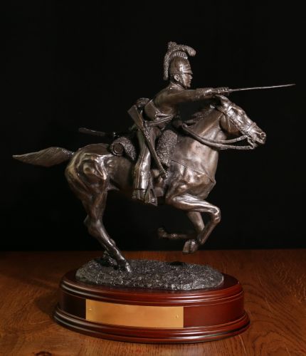 Charge of the Household Brigade during the Battle of Waterloo in 1815. This is our 14 inch tall cold cast bronze display sculpture We offer a choice of wooden bases and an engraved plate with your order
