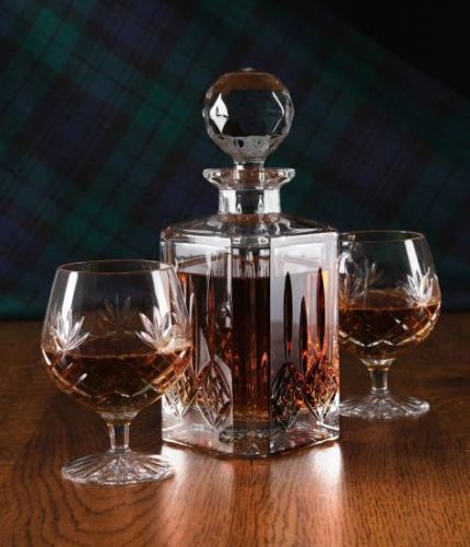 Brandy Decanter and two goblets mounted into a blue satin lined presentation box. This is the Fully cut style and therefore no engraving is possible. The fully cut crystal offer a very classic timeless style. 