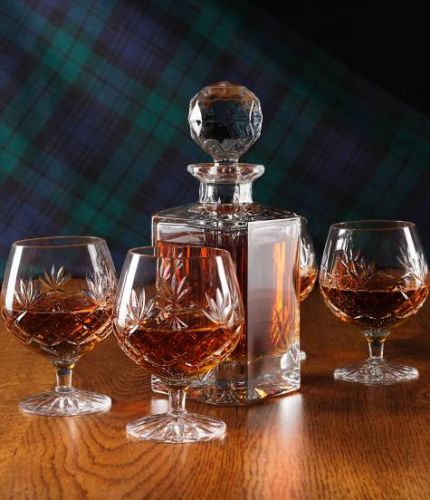 Panel Brandy Decanter and four fully cut goblets mounted into a blue satin lined presentation box. This is the Mixed style and therefore we can only engrave on the decanter.
