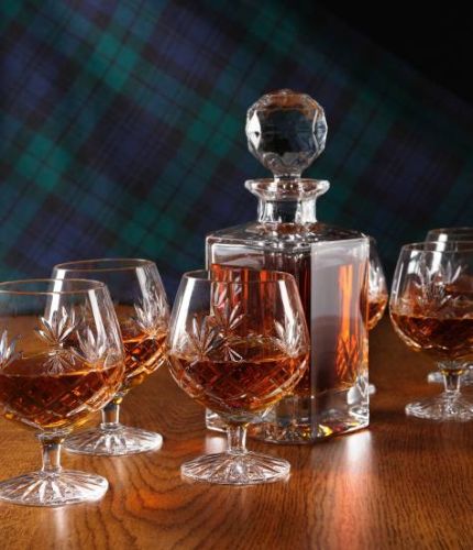 A Mixed Panel cut brandy decanter with 6 fully cut brandy goblets. We offer free engraving in the front panel of the decanter and the set is completed inside two dark blue satin lined presentation boxes.