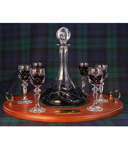 A Fully Cut Port 7 Piece Tray Set. The Set consists of a Ships Decanter and 6 glasses on a wooden serving tray. We offer a free engraved brass plate on the wooden tray if required. 