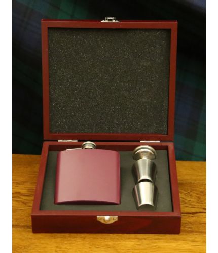 A Maroon 6oz stainless steel hipflask with two thimble cups, filler funnel presented in its own lovely wooden box with cut-out foam inner. We include our full design and engraving service on the front of these items.