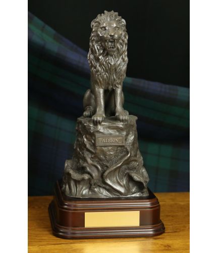 This is a bronze commission sculpture made specifically for the HMS Albion Crew. It depicts the HMS Albion Lion, taken from the Ship's crest on a rock with the name plate 'ALBION' mounted onto the front face below the lion. There are waves below.