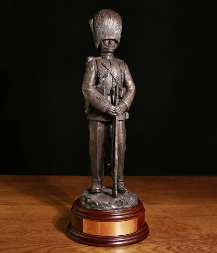 Irish Guards Guardsman Circa 1930 on Parade. This regimental presentation sculpture captures the essence of serving in the Irish Guards. It is sculptured in a 12" scale and you can have us fit an engraved plate to the base free of charge