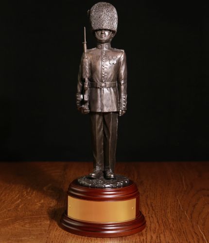 An Irish Guards Guardsman On Parade with the SA80 Rifle. We offer a choice of finishes, wooden bases and free engraving