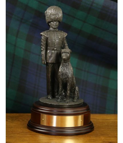 Irish Guards Wolfhound Mascot on parade with his Handler. The Irish Wolfhound, affectionately known to the troops as Seamus, leads the Irish Guards Massed Pipes and Drums. Choice of Base and Finish Available.