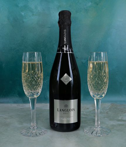 A standard 75cl bottle of Langlois Cremant de Loire Brut and two full cut champagne flutes, all presented in a foam cutout black box. The perfect gift idea for a wedding and birthday