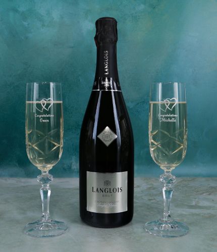 An ENGRAVED 75cl bottle of Langlois Cremant de Loire Brut and two full cut champagne flutes, all presented in a foam cutout black box. The perfect gift idea for a wedding and birthday, we agree the engraving after ordering