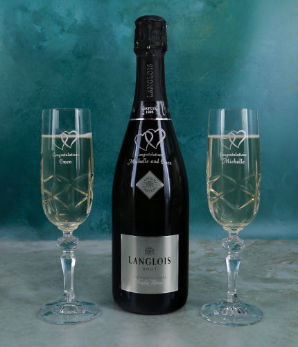 An ENGRAVED 75cl bottle of Langlois Cremant de Loire Brut and two ENGRAVED champagne flutes, all presented in a foam cutout black box. The perfect gift idea for a wedding and birthday. We Agree engraving with you later