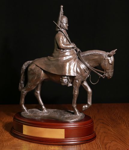 This statue depicts a mounted trooper of The Life Guards in winter dress undertaking ceremonial duties outside the Horse Guards buildings in Whitehall. We offer a choice of finishes, wooden bases and engraving.