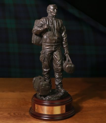 Male Paramedic in the Ambulance Service. This is a 12" scale cold cast bronze sculpture with choice of wooden base and free engraved plate which makes great farewell gift after serving in the Ambulance Service.