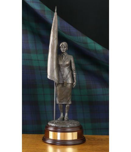 This is our 12" scale Female Standard Bearer Wearing Beret. We can add your regimental cap badge to the base by her feet. We offer a choice of wooden bases and free engraving. 