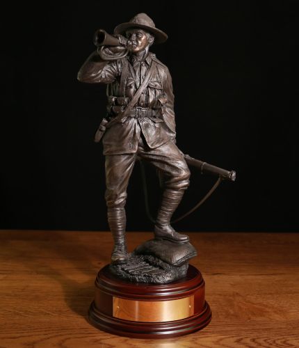 This is a 12" scale sculpture of an New Zealand Army Infantryman during World War 1. We include this wooden base as standard and offer an engraving plate free of charge.