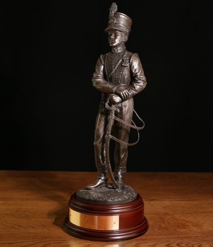 Officer of The Wagon Train Circa 1813. This is a 12" scale sculpture with a choice of finishes, a wooden bases and a fully engraved nameplate on the front of the base. 