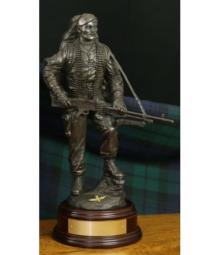 12" scale cold cast bronze sculpture of a British Army Parachute Regiment (PARA) Paratrooper carrying a GPMG on patrol. We include the wooden base you see here as standard and include an optional engraved brass plate