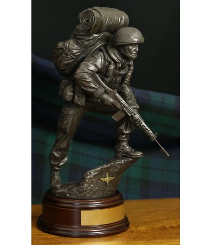 This 12" scale sculpture is of an Airborne Forces Paratrooper. This is exactly correct in every detail for the Falklands War Era, the 1970's & 80's until the SA80 replaced the SLR. The statue includes a personalised engraved plate