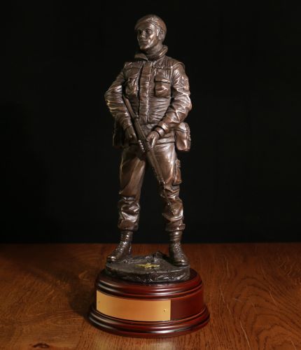 This 12" scale bronze figurine depicts a British Army Paratrooper out on the streets of Belfast or Londonderry during the Ulster conflict. We include this wooden base as standard and also offer an engraved brass plate if required