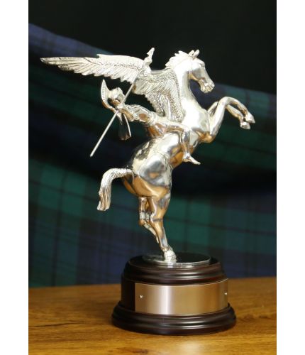 This pure pewter, polished sculpture is of Pegasus and Bellerophon, the symbol of the British Airborne Forces. We offer the ornament with a choice of wooden bases and a free engraved nickel silver plate.
