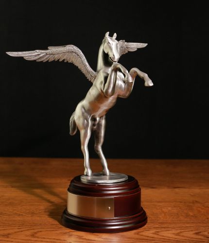 We have a buffed pewter Pegasus on a choice of wooden base. We also include and engraved plate if you require it. 