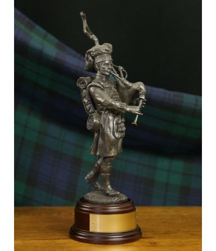 Piper Mackay of the Cameron Highlanders during the battle of Waterloo. This is an 8" scale military regimental statuette and we offer the wooden base and an engraved brass plate as standard.